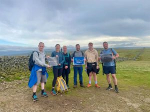 Holding Alzheimer's banner on top of hill 